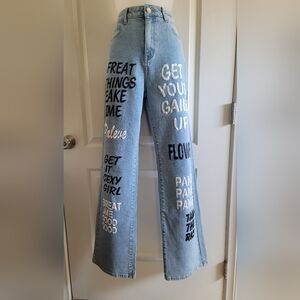 Stylish Blue Women's Shein Jeans with "Oops" Graphics